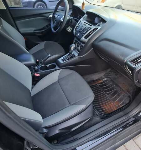 Форд Фокус 2012 в Запорожье на Automoto.ua Черный Форд Фокус, объемом двигателя 2 л и пробегом 159 тыс. км за 7000 $, фото 11 на Automoto.ua