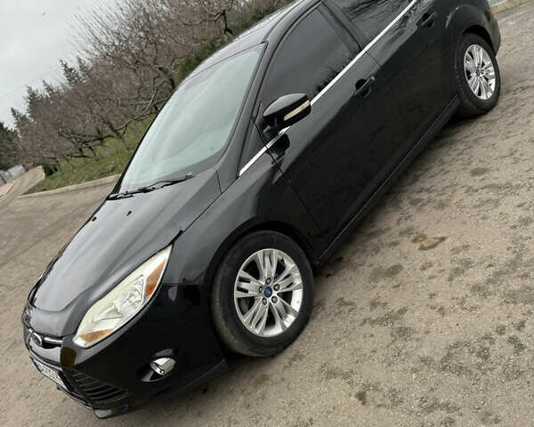 Чорний Форд Фокус, об'ємом двигуна 2 л та пробігом 230 тис. км за 7000 $, фото 3 на Automoto.ua