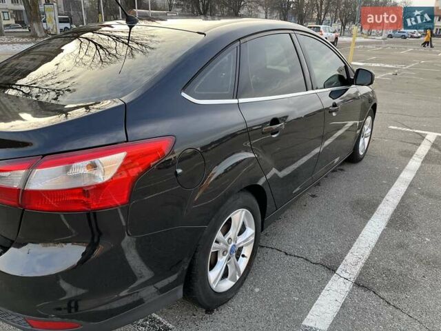 Черный Форд Фокус, объемом двигателя 1.6 л и пробегом 205 тыс. км за 7500 $, фото 1 на Automoto.ua