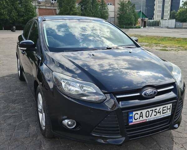 Черный Форд Фокус, объемом двигателя 1.6 л и пробегом 129 тыс. км за 6850 $, фото 7 на Automoto.ua
