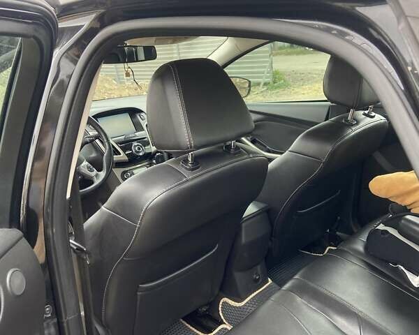 Чорний Форд Фокус, об'ємом двигуна 2 л та пробігом 215 тис. км за 7300 $, фото 4 на Automoto.ua