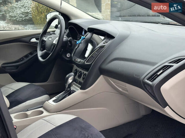 Чорний Форд Фокус, об'ємом двигуна 2 л та пробігом 230 тис. км за 5450 $, фото 14 на Automoto.ua