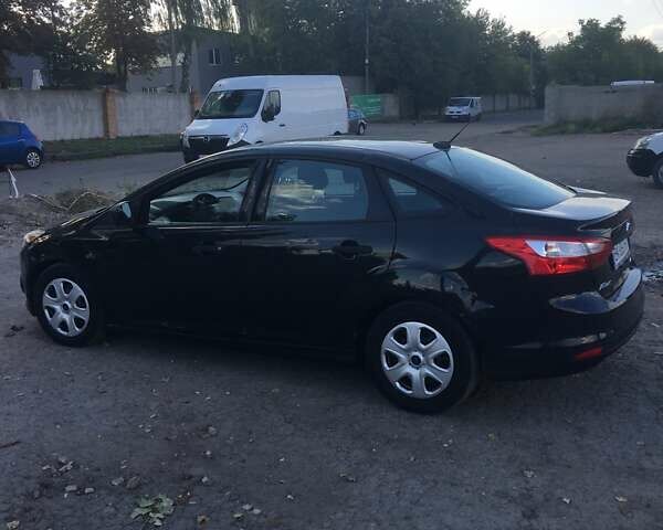 Чорний Форд Фокус, об'ємом двигуна 2 л та пробігом 253 тис. км за 6500 $, фото 2 на Automoto.ua