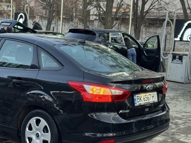 Чорний Форд Фокус, об'ємом двигуна 2 л та пробігом 190 тис. км за 4900 $, фото 12 на Automoto.ua