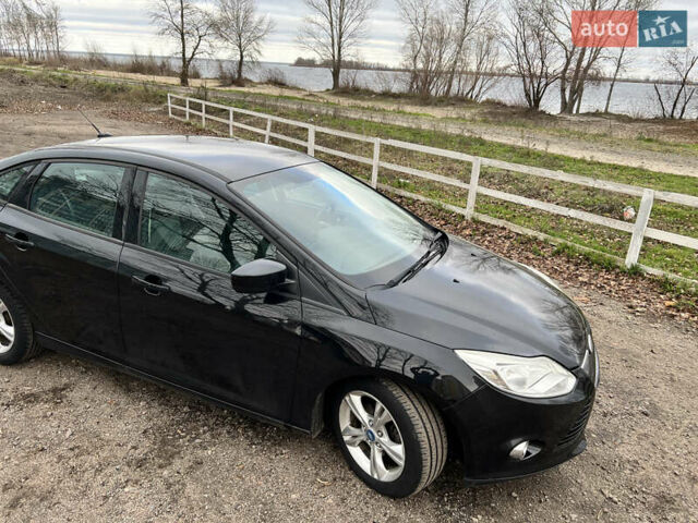 Черный Форд Фокус, объемом двигателя 2 л и пробегом 159 тыс. км за 7999 $, фото 9 на Automoto.ua