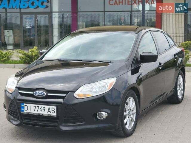 Черный Форд Фокус, объемом двигателя 2 л и пробегом 225 тыс. км за 5500 $, фото 1 на Automoto.ua