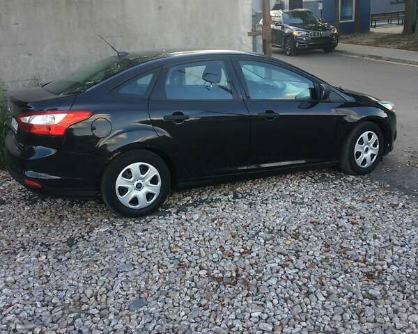 Чорний Форд Фокус, об'ємом двигуна 2 л та пробігом 253 тис. км за 6500 $, фото 1 на Automoto.ua
