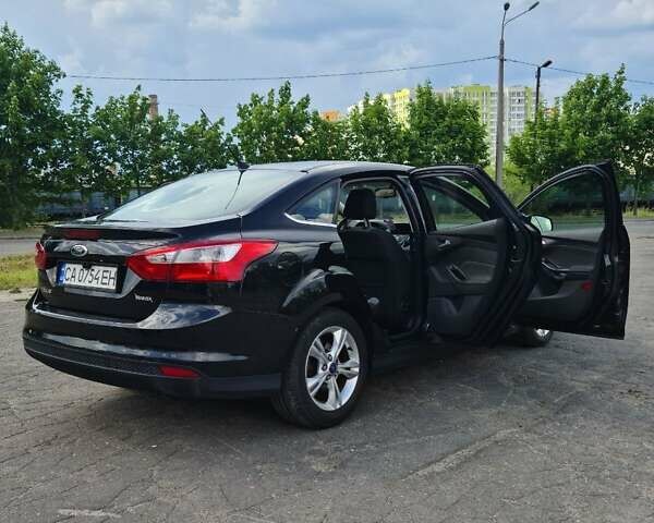 Черный Форд Фокус, объемом двигателя 1.6 л и пробегом 129 тыс. км за 6850 $, фото 9 на Automoto.ua