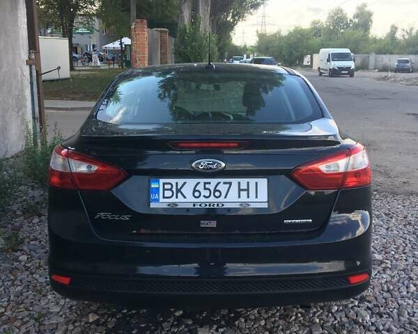 Чорний Форд Фокус, об'ємом двигуна 2 л та пробігом 253 тис. км за 6500 $, фото 5 на Automoto.ua