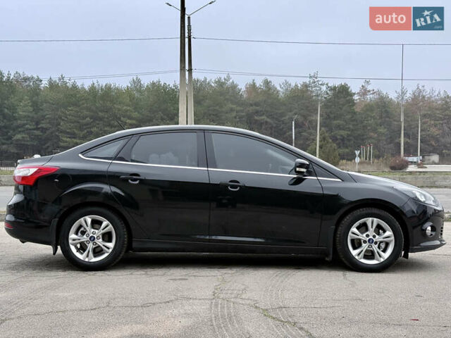 Черный Форд Фокус, объемом двигателя 1.6 л и пробегом 121 тыс. км за 7900 $, фото 2 на Automoto.ua