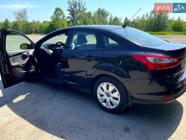 Чорний Форд Фокус, об'ємом двигуна 1.6 л та пробігом 139 тис. км за 9700 $, фото 5 на Automoto.ua