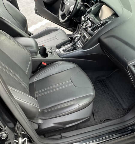 Чорний Форд Фокус, об'ємом двигуна 2 л та пробігом 79 тис. км за 7000 $, фото 13 на Automoto.ua