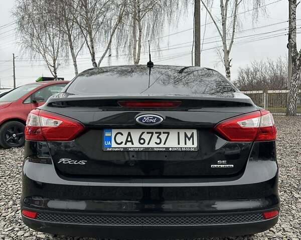 Черный Форд Фокус, объемом двигателя 2 л и пробегом 329 тыс. км за 6500 $, фото 5 на Automoto.ua