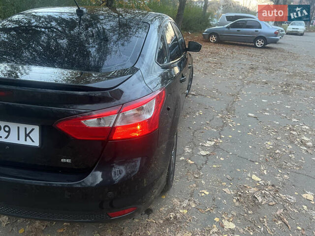 Чорний Форд Фокус, об'ємом двигуна 2 л та пробігом 163 тис. км за 7700 $, фото 10 на Automoto.ua
