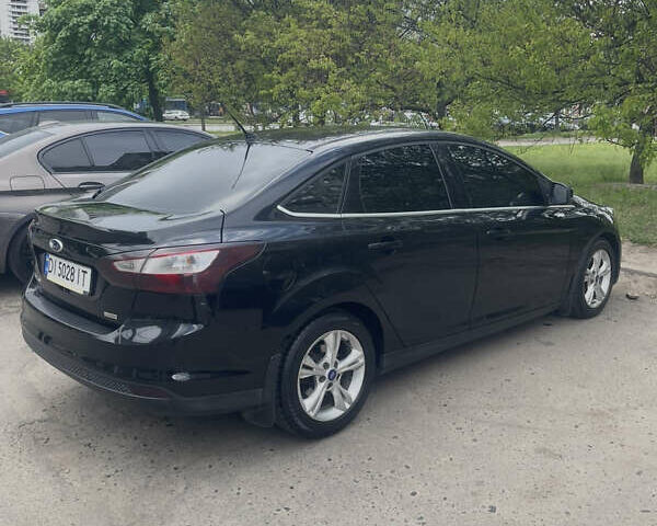 Черный Форд Фокус, объемом двигателя 1 л и пробегом 198 тыс. км за 5800 $, фото 2 на Automoto.ua