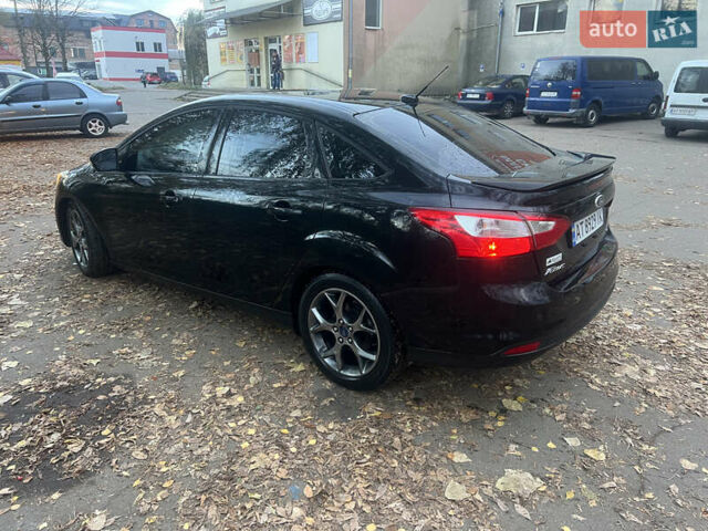 Чорний Форд Фокус, об'ємом двигуна 2 л та пробігом 163 тис. км за 7700 $, фото 5 на Automoto.ua
