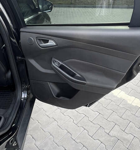 Чорний Форд Фокус, об'ємом двигуна 2 л та пробігом 79 тис. км за 7000 $, фото 16 на Automoto.ua