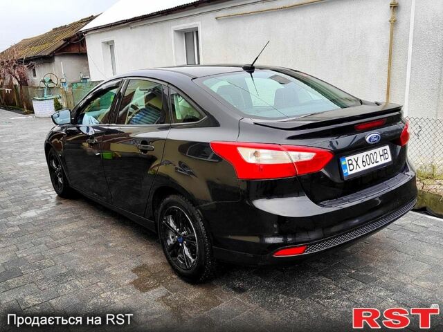 Форд Фокус 2013 у Хмельницькому на Automoto.ua Чорний Форд Фокус, об'ємом двигуна 2 л та пробігом 141 тис. км за 9500 $, фото 7 на Automoto.ua
