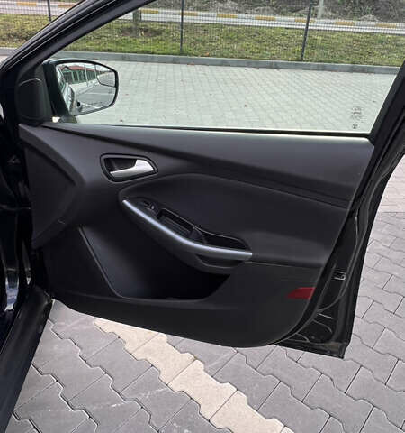 Чорний Форд Фокус, об'ємом двигуна 2 л та пробігом 79 тис. км за 7000 $, фото 17 на Automoto.ua