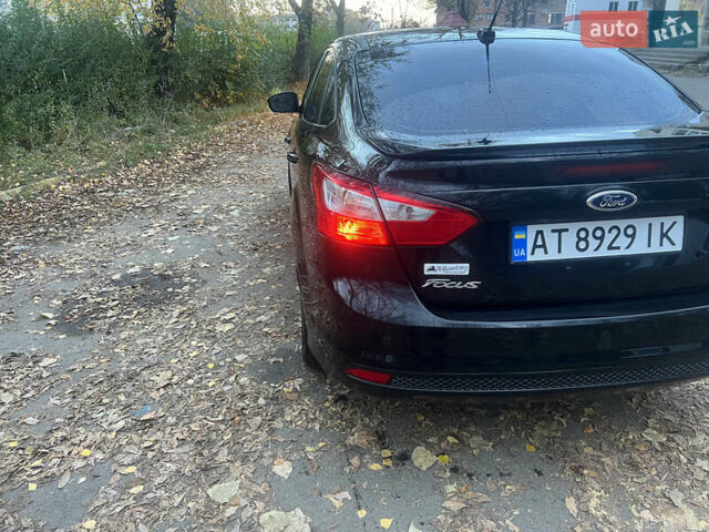 Чорний Форд Фокус, об'ємом двигуна 2 л та пробігом 163 тис. км за 7700 $, фото 7 на Automoto.ua