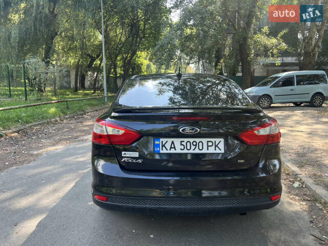 Черный Форд Фокус, объемом двигателя 2 л и пробегом 159 тыс. км за 6850 $, фото 5 на Automoto.ua