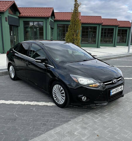 Чорний Форд Фокус, об'ємом двигуна 2 л та пробігом 79 тис. км за 7000 $, фото 2 на Automoto.ua
