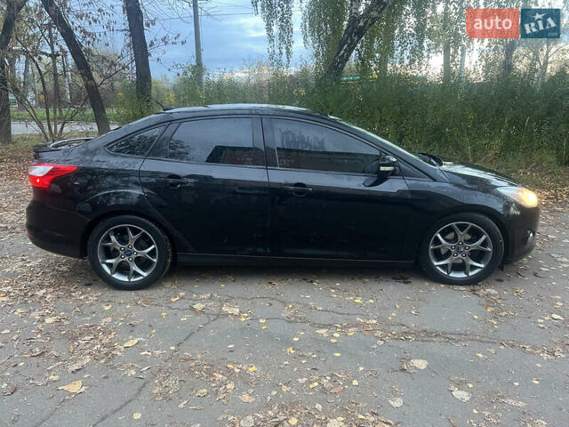 Чорний Форд Фокус, об'ємом двигуна 2 л та пробігом 163 тис. км за 7700 $, фото 12 на Automoto.ua