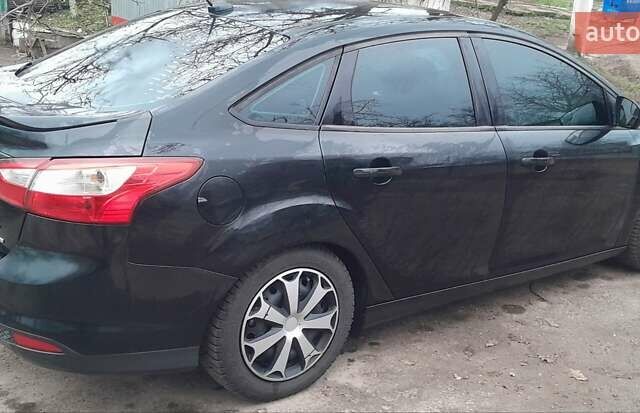 Чорний Форд Фокус, об'ємом двигуна 2 л та пробігом 227 тис. км за 7800 $, фото 8 на Automoto.ua