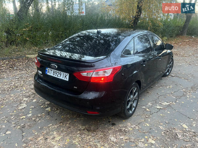 Чорний Форд Фокус, об'ємом двигуна 2 л та пробігом 163 тис. км за 7700 $, фото 9 на Automoto.ua