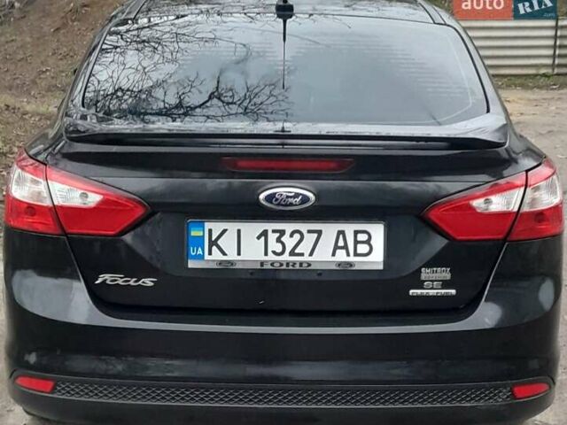 Чорний Форд Фокус, об'ємом двигуна 2 л та пробігом 227 тис. км за 7800 $, фото 12 на Automoto.ua