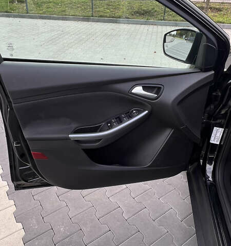 Чорний Форд Фокус, об'ємом двигуна 2 л та пробігом 79 тис. км за 7000 $, фото 14 на Automoto.ua