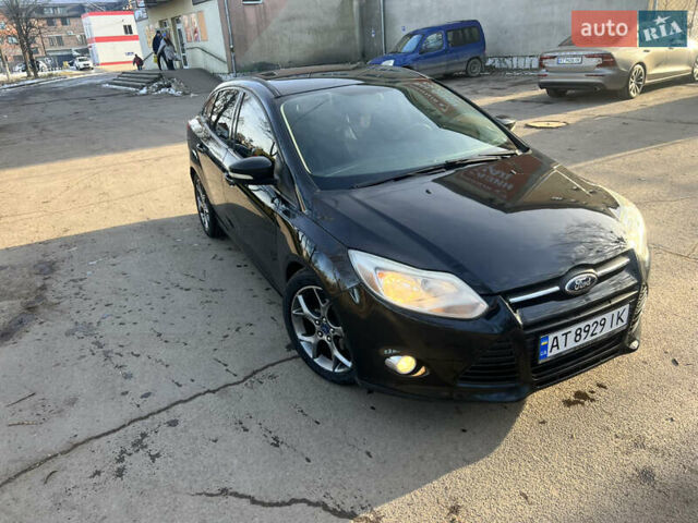 Чорний Форд Фокус, об'ємом двигуна 2 л та пробігом 165 тис. км за 8350 $, фото 14 на Automoto.ua