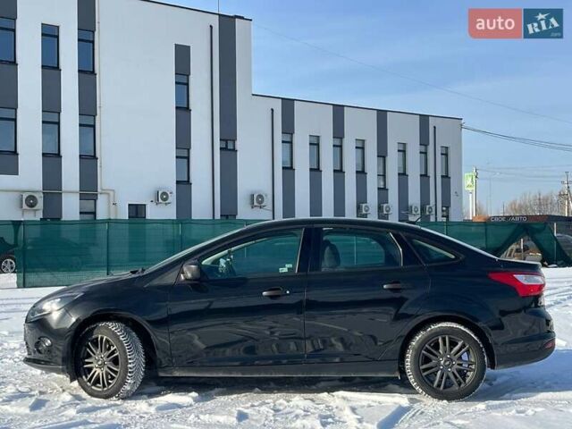 Чорний Форд Фокус, об'ємом двигуна 2 л та пробігом 189 тис. км за 6299 $, фото 3 на Automoto.ua