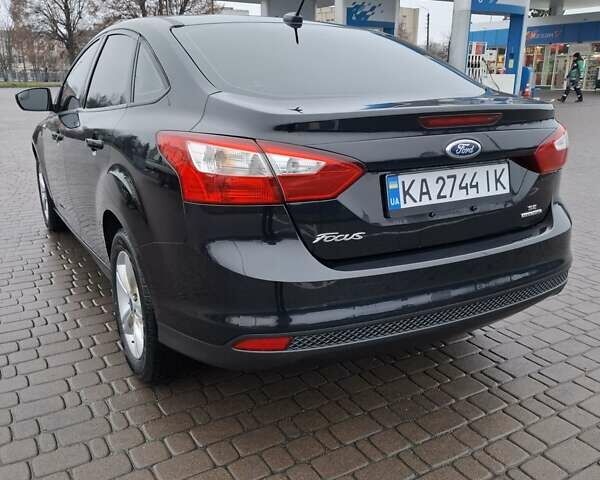Чорний Форд Фокус, об'ємом двигуна 2 л та пробігом 178 тис. км за 7300 $, фото 12 на Automoto.ua