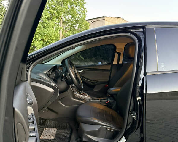 Форд Фокус 2013 в Днепре (Днепропетровске) на Automoto.ua Черный Форд Фокус, объемом двигателя 2 л и пробегом 221 тыс. км за 8000 $, фото 11 на Automoto.ua