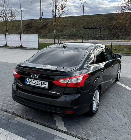 Чорний Форд Фокус, об'ємом двигуна 2 л та пробігом 79 тис. км за 7000 $, фото 4 на Automoto.ua