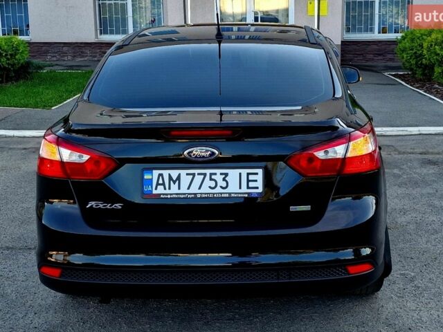 Чорний Форд Фокус, об'ємом двигуна 1 л та пробігом 65 тис. км за 8670 $, фото 5 на Automoto.ua