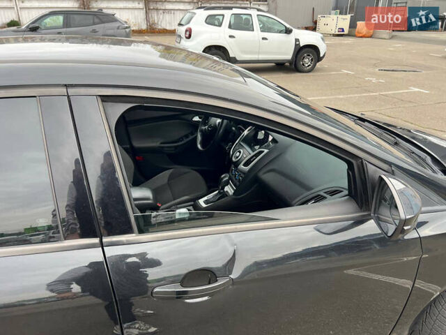 Черный Форд Фокус, объемом двигателя 2 л и пробегом 300 тыс. км за 7500 $, фото 15 на Automoto.ua