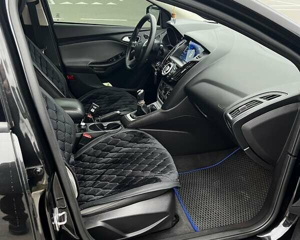 Черный Форд Фокус, объемом двигателя 2 л и пробегом 215 тыс. км за 8500 $, фото 9 на Automoto.ua