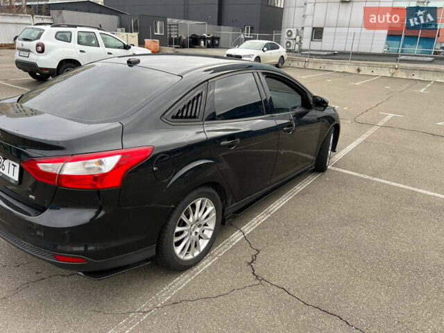 Черный Форд Фокус, объемом двигателя 2 л и пробегом 300 тыс. км за 7500 $, фото 6 на Automoto.ua