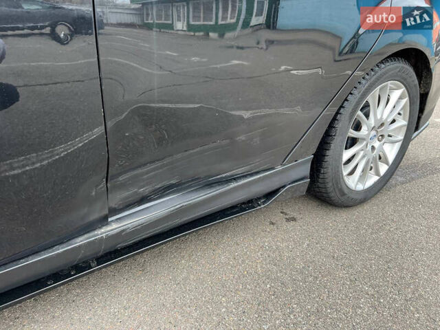 Черный Форд Фокус, объемом двигателя 2 л и пробегом 300 тыс. км за 7500 $, фото 12 на Automoto.ua