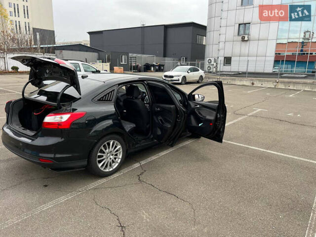 Черный Форд Фокус, объемом двигателя 2 л и пробегом 300 тыс. км за 7500 $, фото 20 на Automoto.ua