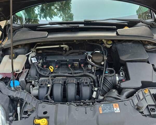 Черный Форд Фокус, объемом двигателя 2 л и пробегом 160 тыс. км за 7700 $, фото 9 на Automoto.ua