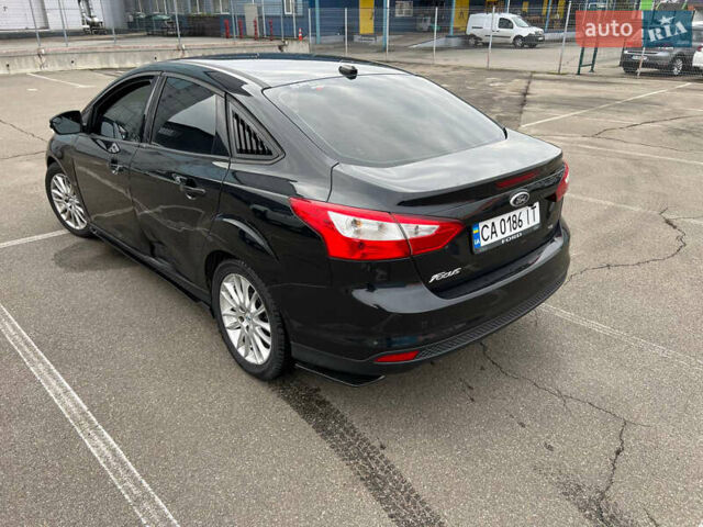 Черный Форд Фокус, объемом двигателя 2 л и пробегом 300 тыс. км за 7500 $, фото 5 на Automoto.ua