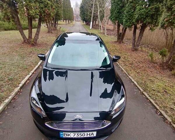 Черный Форд Фокус, объемом двигателя 2 л и пробегом 154 тыс. км за 7800 $, фото 1 на Automoto.ua