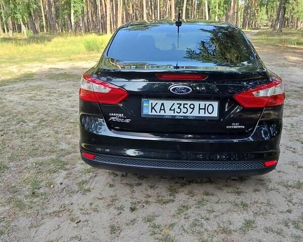 Черный Форд Фокус, объемом двигателя 2 л и пробегом 160 тыс. км за 7700 $, фото 7 на Automoto.ua