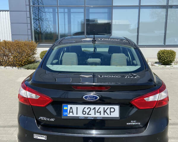 Чорний Форд Фокус, об'ємом двигуна 2 л та пробігом 130 тис. км за 7100 $, фото 5 на Automoto.ua