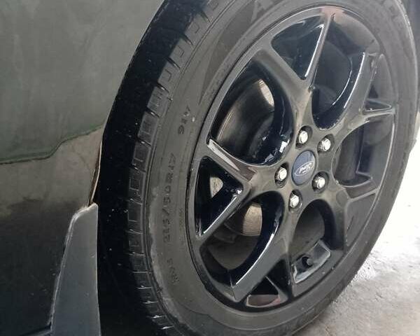 Чорний Форд Фокус, об'ємом двигуна 2 л та пробігом 230 тис. км за 7500 $, фото 11 на Automoto.ua