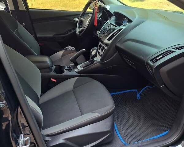 Черный Форд Фокус, объемом двигателя 2 л и пробегом 160 тыс. км за 7700 $, фото 2 на Automoto.ua