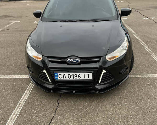 Черный Форд Фокус, объемом двигателя 2 л и пробегом 300 тыс. км за 7500 $, фото 1 на Automoto.ua